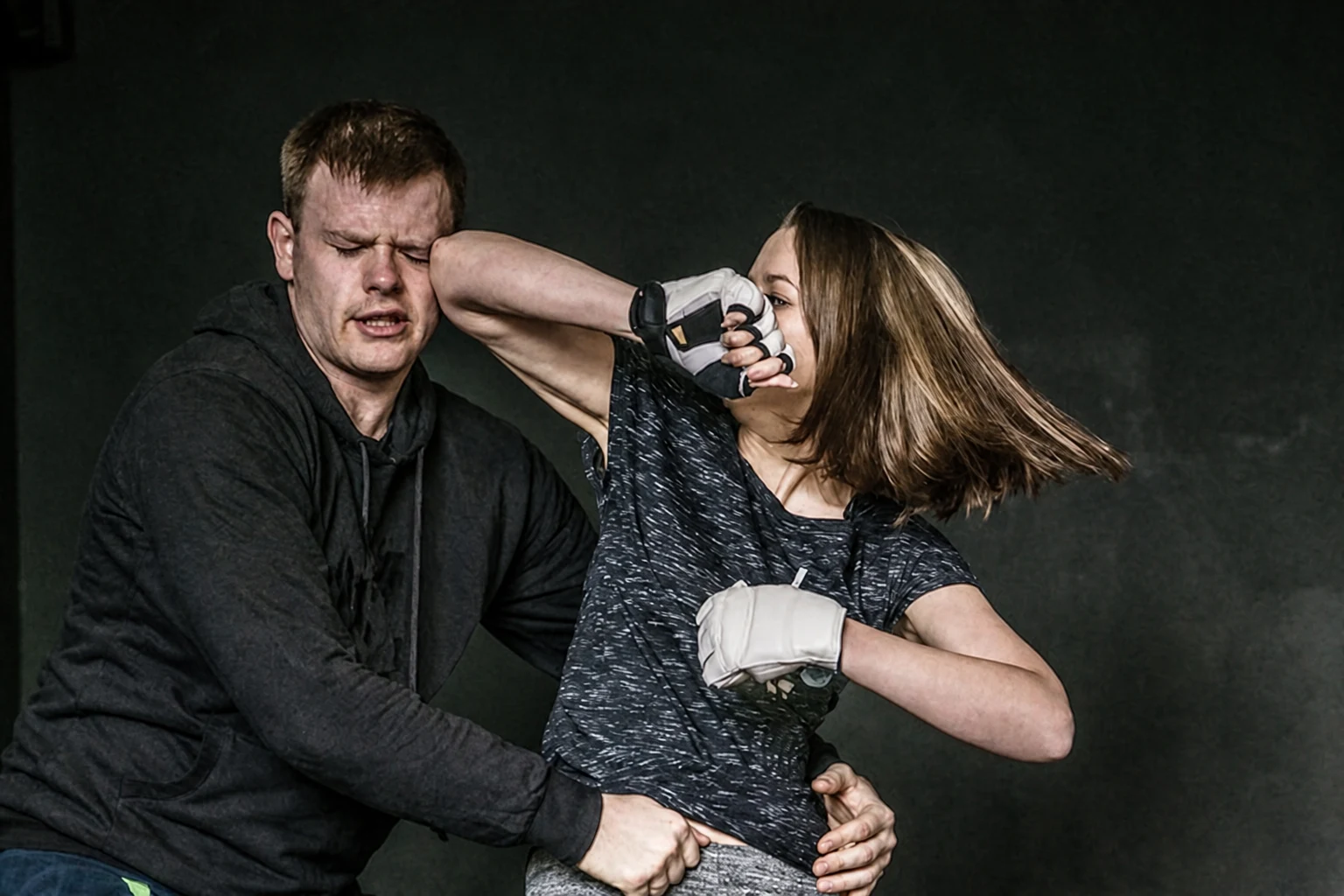 Krav Maga self-defence demonstration against a grab from behind